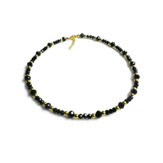 Black crystal beads with gold beads and adjustable chain
