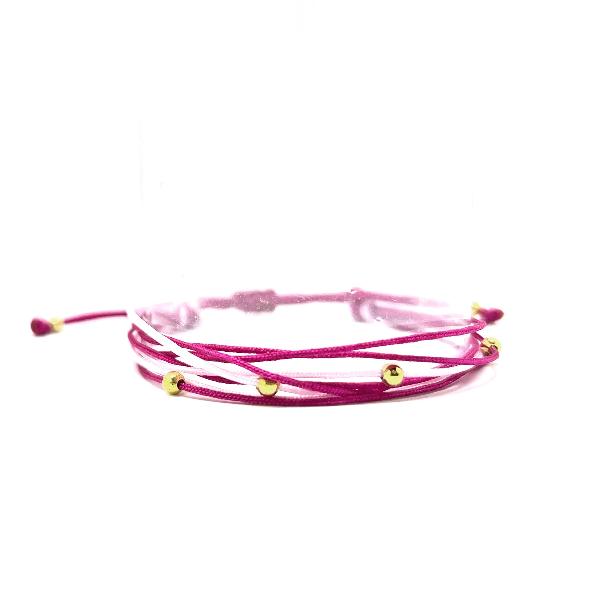Fushia colorful bracelets are the perfect accessory for summer, adding a pop of color and a touch of glam to any outfit. Whether you're headed to the beach or out for a night on the town, these bracelets are sure to complement your style and make a statement.