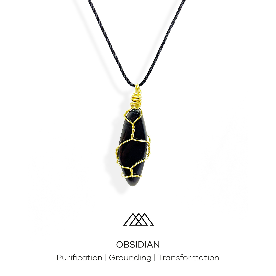Experience the Power of Obsidian in a Unique Gold-Wrapped Pendant This crystal is known for its ability to purify, ground and transform. Now, you can wear it as a pendant and enjoy its benefits in style. The obsidian crystal has been carefully wrapped with gold wire to create a truly unique piece.