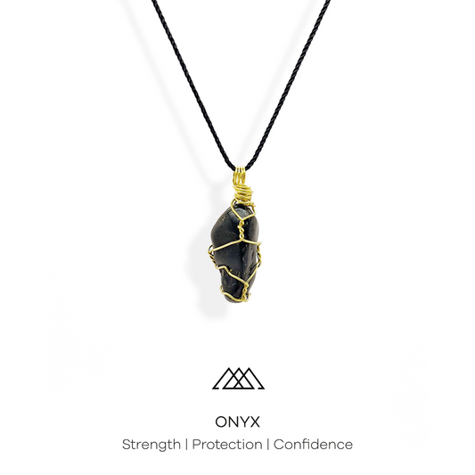 The Onyx crystal is known for its ability to provide strength, protection, and confidence. This pendant, made with a carefully wrapped gold wire, is a truly unique piece.