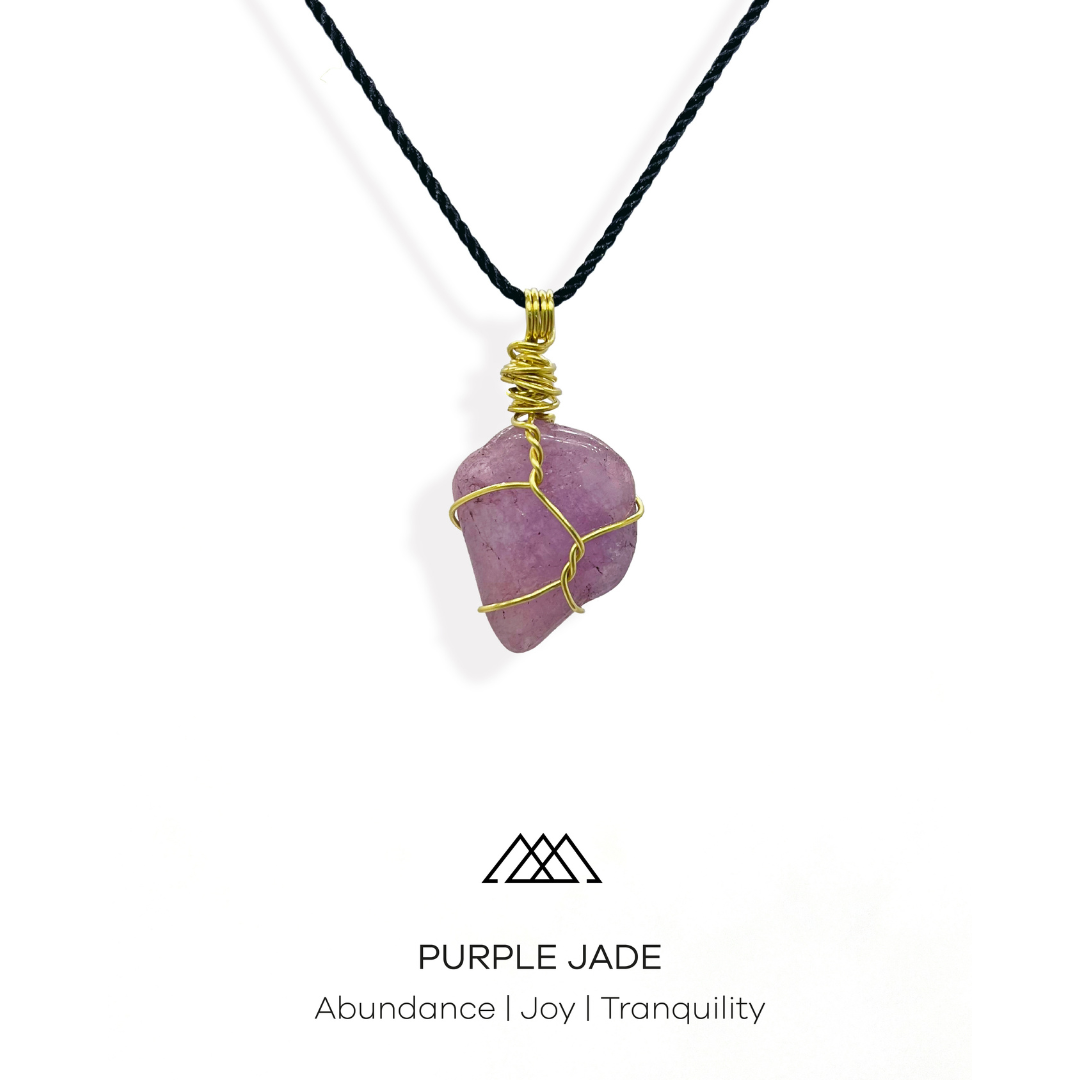  Experience Abundance, Joy, and Tranquility with the Purple Jade Crystal Pendant This stunning crystal pendant is made from intricately wrapped purple jade and gold wire, making it a one-of-a-kind piece. 