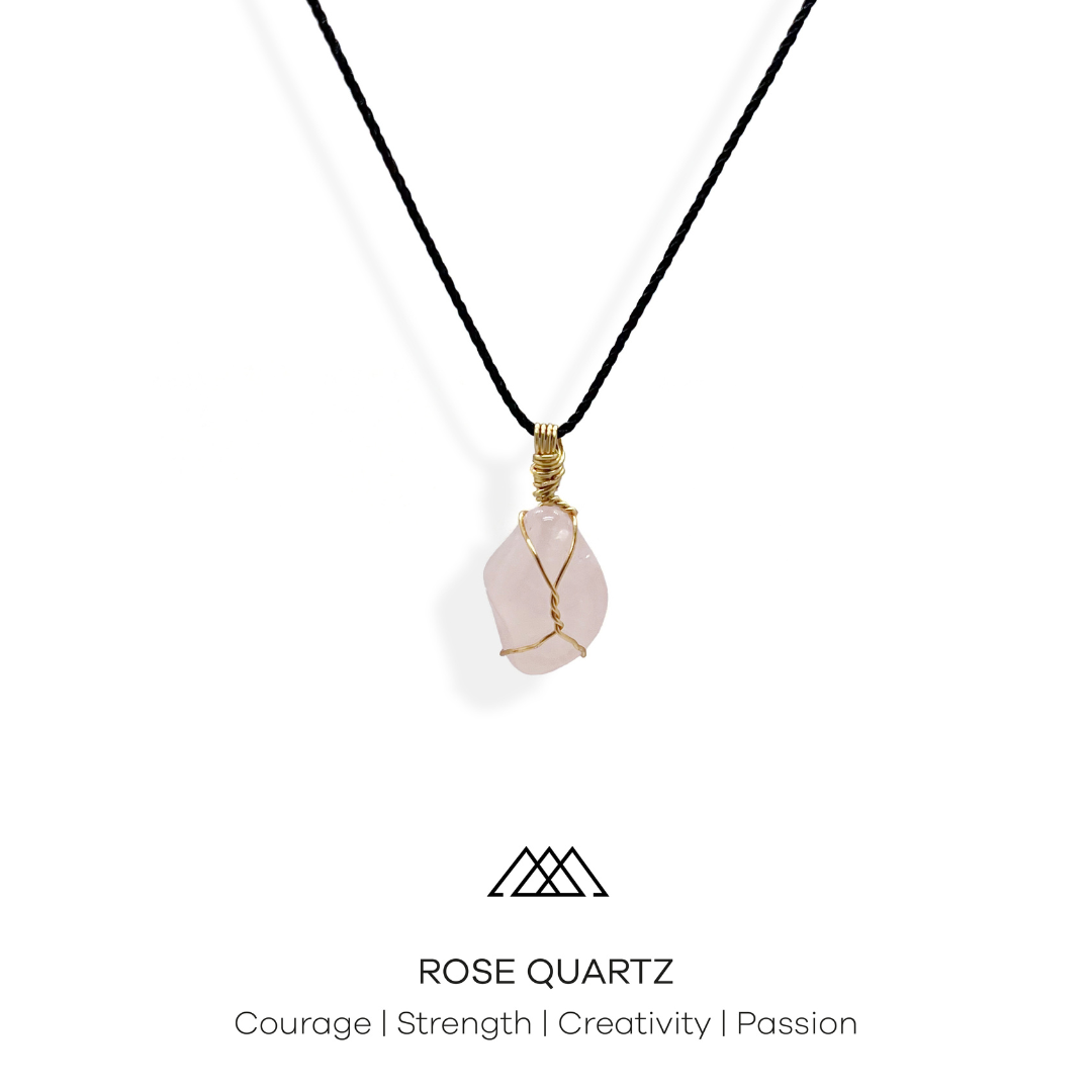 A Unique Pendant Made with Gold Wire and Rose Quartz Crystal This exquisite pendant, featuring a Rose Quartz crystal, represents courage, strength, creativity and passion. The crystal has been meticulously wrapped with gold wire to create a one-of-a-kind piece that is sure to capture attention.