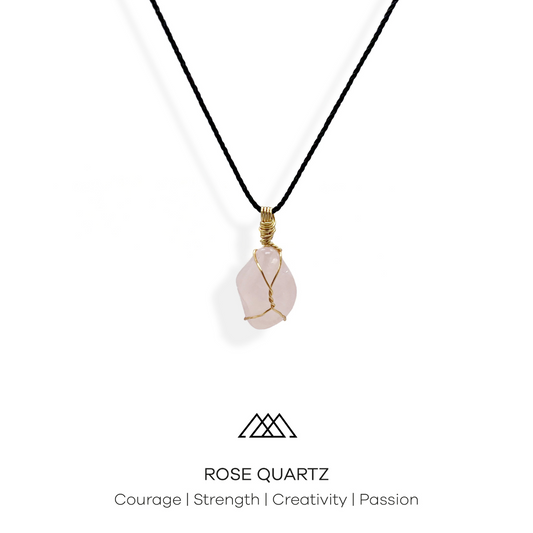 A Unique Pendant Made with Gold Wire and Rose Quartz Crystal This exquisite pendant, featuring a Rose Quartz crystal, represents courage, strength, creativity and passion. The crystal has been meticulously wrapped with gold wire to create a one-of-a-kind piece that is sure to capture attention.